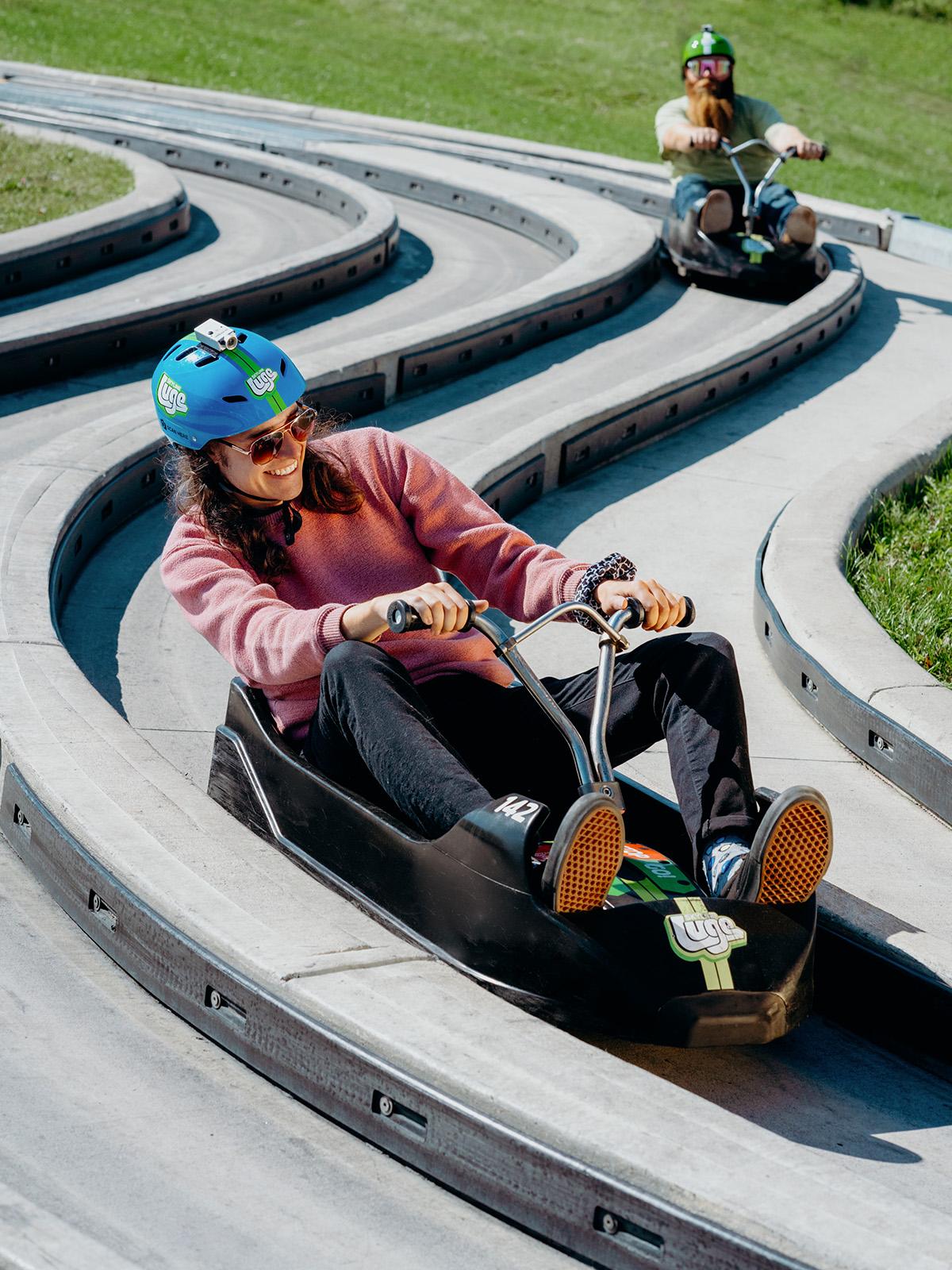 A lady finishes her ride down the Downhill Karting Calgary tracks.